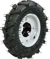 Side view of assembled tire and rim showing tread pattern and valve stem