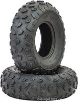Two Hakuba Bedrock ATV tires stacked showing tread and sidewall
