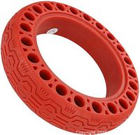 Red honeycomb solid tire side view showing tread and circular holes
