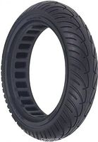 Angled view showing honeycomb cavities and tread