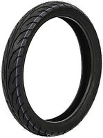 Angled view of full tire showing tread and sidewall