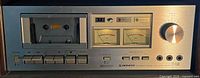 Front view of Pioneer CT-F500 tape deck showing cassette bay, VU meters and control buttons
