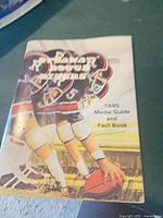 Front cover showing Ottawa Rough Riders players and title graphics