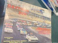 Front cover of 1981 Daytona 500 program showing race scene
