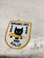 Front of embroidered patch showing full design and colours