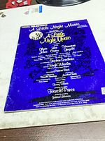 Back cover listing song titles and credits
