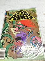 Front cover of Battle of the Planets #4 in bag with backing board