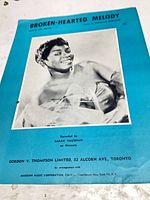 Front cover showing title, artist photo, publisher