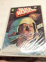 Front cover of 1980 Whitman Buck Rogers comic in bag with backing board