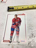 Front of Chris Chelios promotional postcard with ruler for scale
