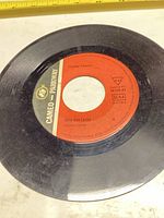 Side showing Mary Ann Limbo label on one 7" vinyl