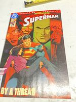 Front cover of Superman #27 comic showing artwork, subtitle and characters