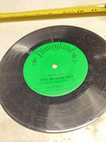 Side 1 of the 10" Disneyland Records vinyl showing green label with title and catalogue number