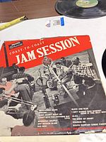 Front sleeve showing album title, artist and cover wear