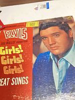 Front album cover with Elvis Presley portrait and title Girls! Girls! Girls!