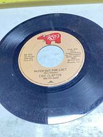 A-side label showing Watch Out For Lucy, RSO RS 910