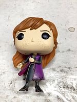 Front view of Anna Funko Pop figure showing face, outfit and paint condition