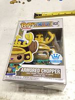 Front view of boxed Armored Chopper Funko Pop! showing figure, number 1131 and Funko Exclusive sticker