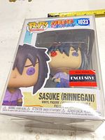 Front of boxed Funko Pop Sasuke (Rinnegan) #1023 showing figure and branding