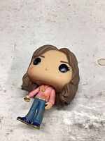 Front view of Funko Pop showing outfit and face