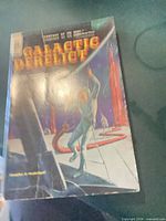 Front cover of Galactic Derelict paperback