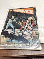 Front cover of Lost in Space #58 in bag with board