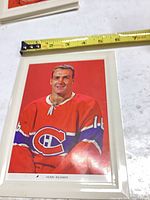 Framed colour portrait of Henri Richard showing full image with measuring tape indicating width