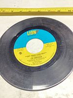 A-side label showing Cry Your Eyes Out, Lion Records branding