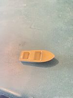 Top view showing tan deck with two recessed areas