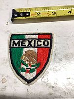 Front view of patch with ruler showing size