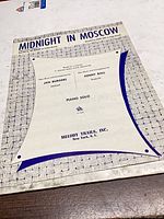 Front cover of Midnight In Moscow sheet music showing title, arranger credits and publisher