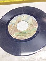 Side A label "It's All Over" on Mercury 7" record