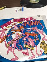 Front sleeve artwork featuring Pink Panther characters