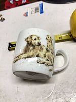 Side view showing adult Golden Retriever illustration on mug
