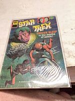 Front view of bagged Star Trek Gold Key comic showing full cover art and title