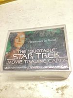 Front view of stack inside clear case showing title card “Resistance Is Futile!”