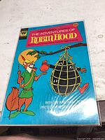 Front cover of oversized comic in sleeve showing title, artwork and 20¢ price