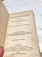 Open book showing title page with publication details