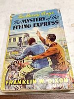 Front of dust-jacketed book showing title, author and artwork