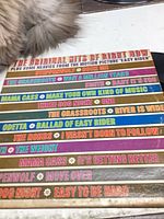 Spine edge and front cover song list visible
