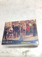Front of Heroes: Generations card box showing character lineup and logo