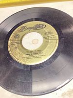 Side A label showing Beograd Disk branding, track information, catalog number NN4-201, and visible surface scratches