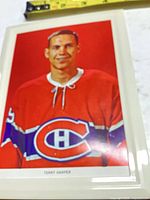 Front view of laminated color photograph featuring Terry Harper in Canadiens jersey with measuring tape partially visible