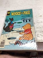 Front cover of bagged Whitman Winnie the Pooh comic showing artwork and title