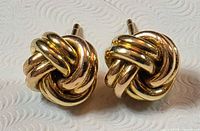 Front view of knot stud earrings