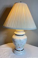 Lamp lit showing full view with shade