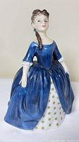 Front three-quarter view of Debbie figurine