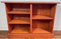 Front view showing full bookshelf structure, shelves, and finish