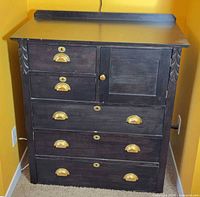 Front view of dresser, drawers and door closed