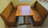 Dining nook set showing both benches and table